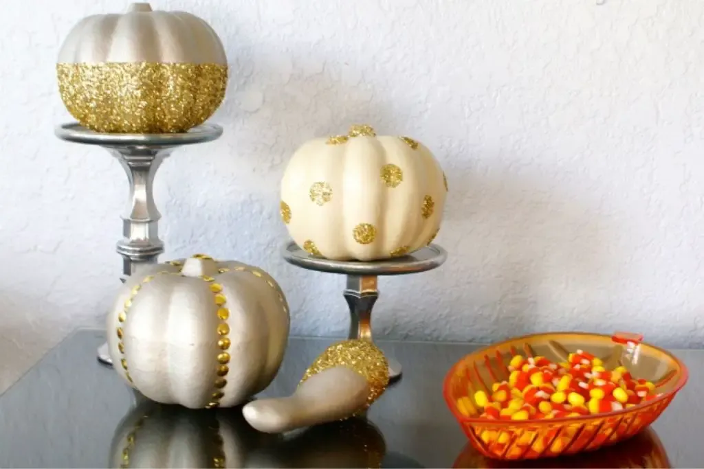 Dollar Store Glitter Glam Pumpkins and DIY Pedestals