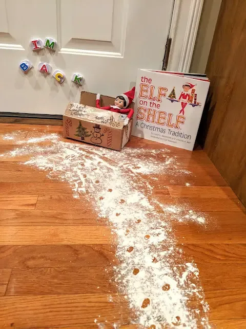 Arrival With Flour Footprints and A Box
